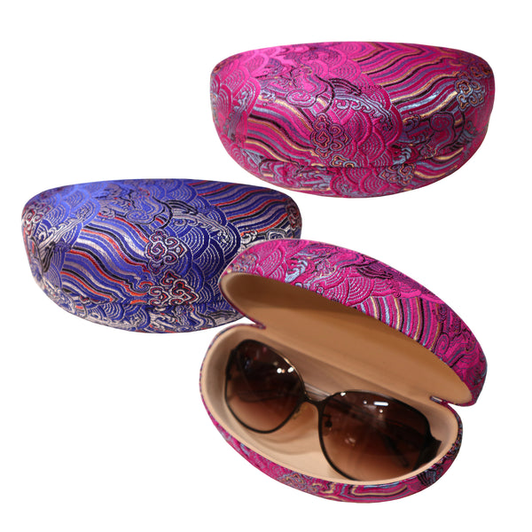 Purple and blue sunglass cases with one case open showing sunglasses