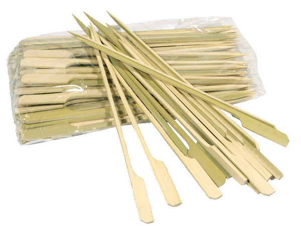 single skewers on top of a bag of packaged skewers