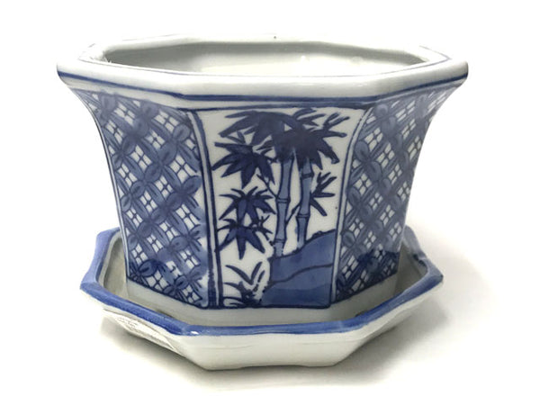 Blue on white ceramic planter with bamboo design