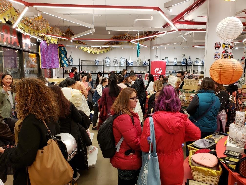 Gathering of people at Pearl River Mart at Chelsea Market