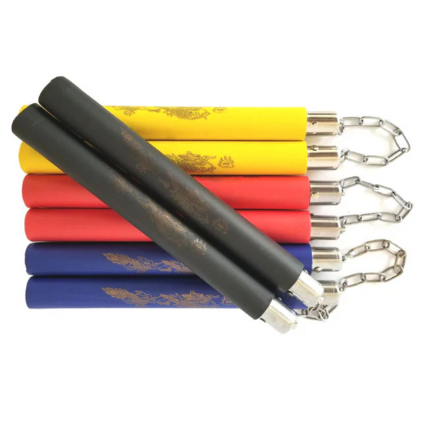 Four foam wrapped nunchakus. The black colored foamed nunchaku is on top of the yellow, red and blue nunchakus